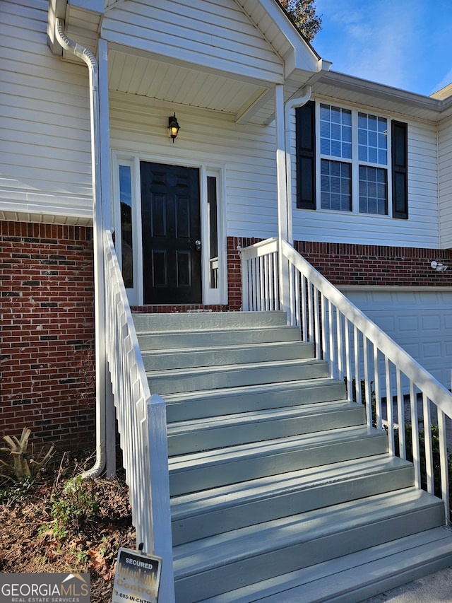 property entrance featuring a garage