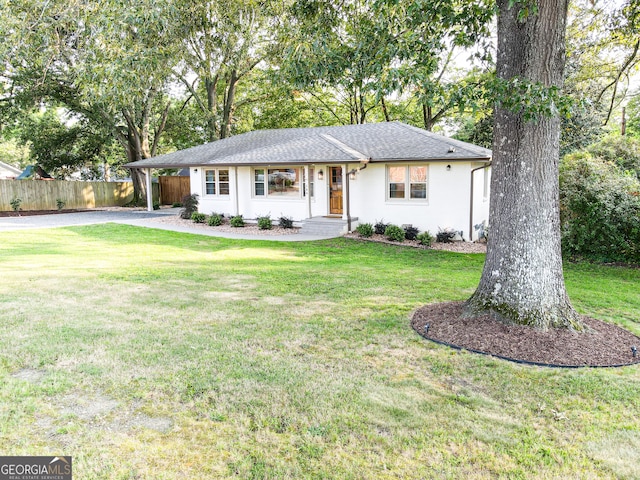 single story home with a front yard