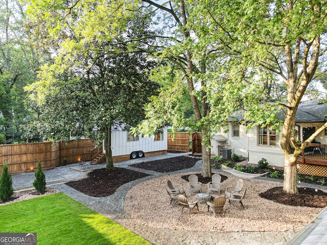 view of yard with central air condition unit