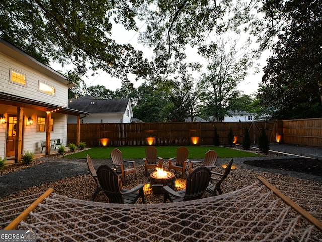 view of patio featuring an outdoor fire pit