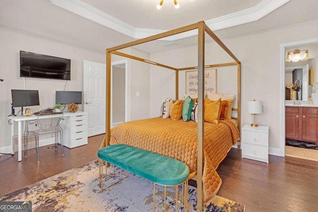 bedroom featuring sink, ensuite bathroom, crown molding, and dark wood-type flooring