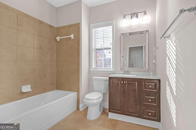 full bathroom with toilet, vanity, tiled shower / bath combo, and tile patterned floors