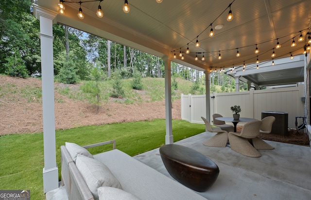 view of patio with central AC unit