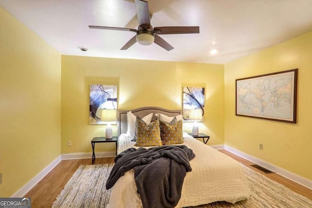 bedroom featuring ceiling fan and light wood-type flooring