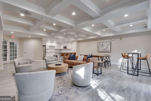 living room with beamed ceiling and coffered ceiling