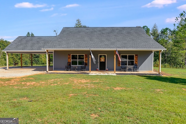 view of front of property featuring covered porch and a front yard