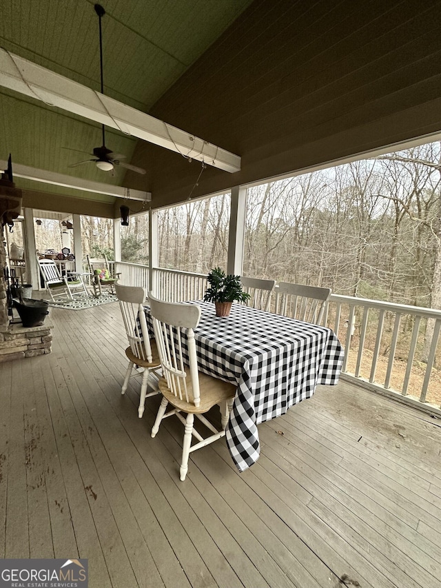 wooden terrace with ceiling fan