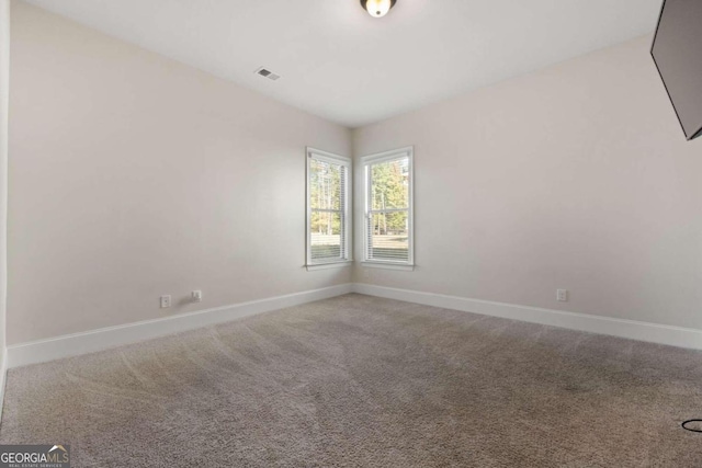 view of carpeted spare room