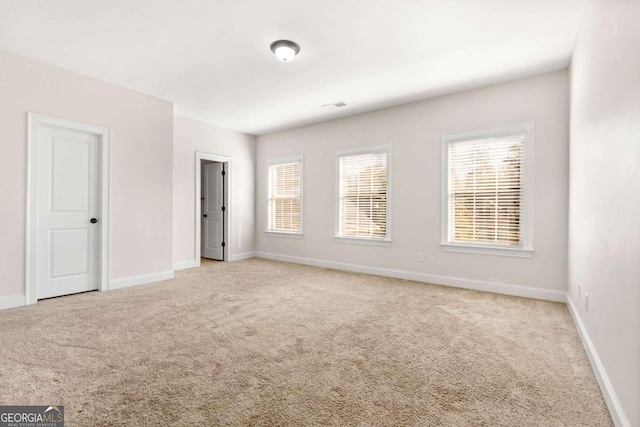 view of carpeted spare room