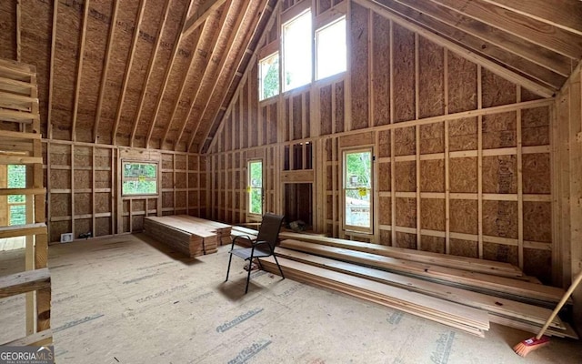 attic featuring a wealth of natural light