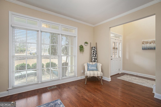 unfurnished room with dark wood-type flooring and ornamental molding