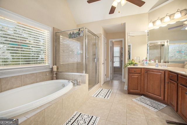 bathroom with ceiling fan, lofted ceiling, separate shower and tub, and tile patterned flooring