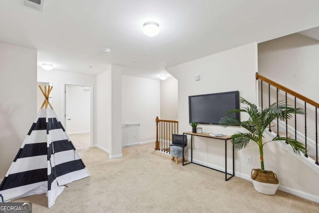 sitting room with light carpet