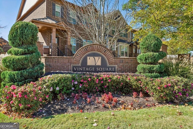 view of community sign