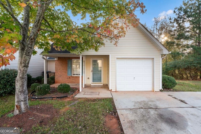 view of front of house with a porch and a garage