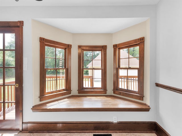 doorway to outside featuring a wealth of natural light