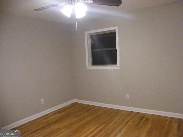 unfurnished room featuring wood-type flooring and ceiling fan