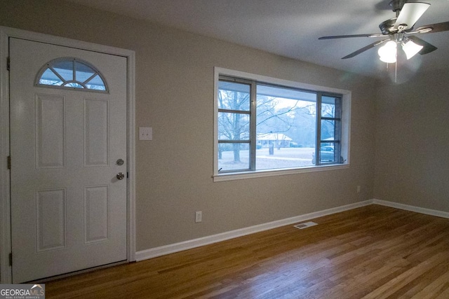 entrance foyer featuring ceiling fan and hardwood / wood-style floors