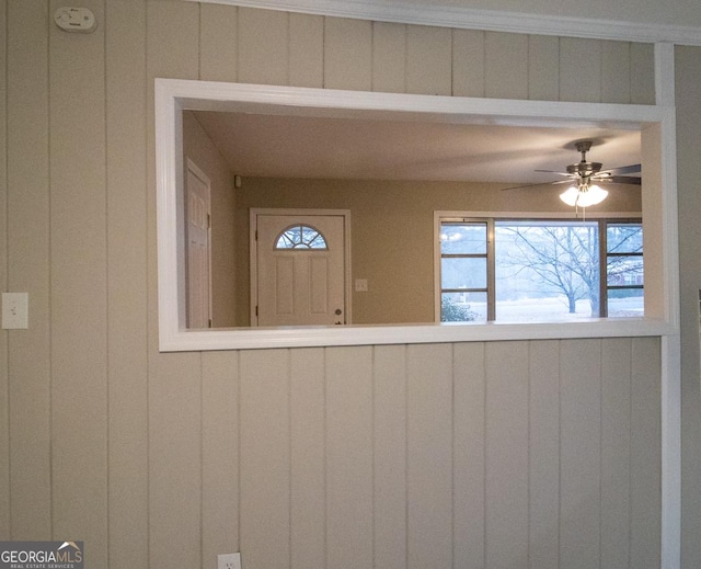 room details with crown molding and ceiling fan