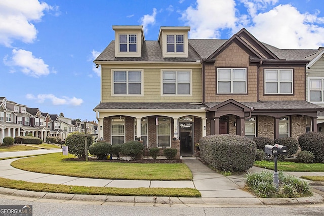 view of front of home with a front yard