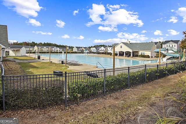 view of pool featuring a water slide