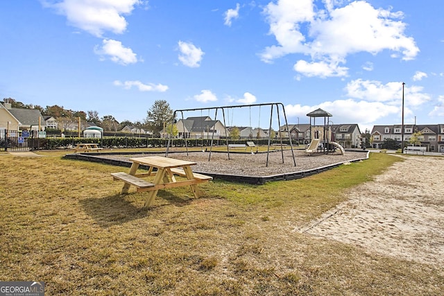 view of playground featuring a yard