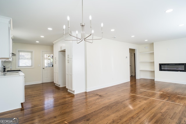 interior space featuring sink and dark hardwood / wood-style floors