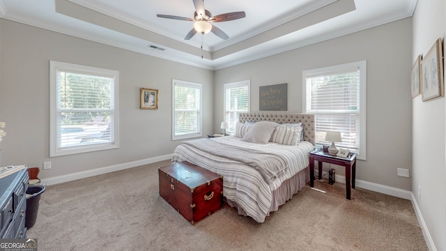 bedroom featuring ceiling fan, light colored carpet, and ornamental molding