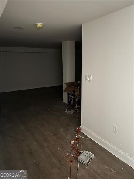 interior space featuring dark hardwood / wood-style flooring