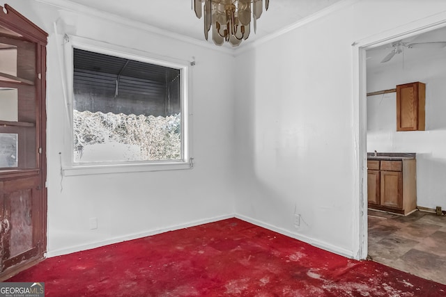 empty room with ceiling fan with notable chandelier and ornamental molding