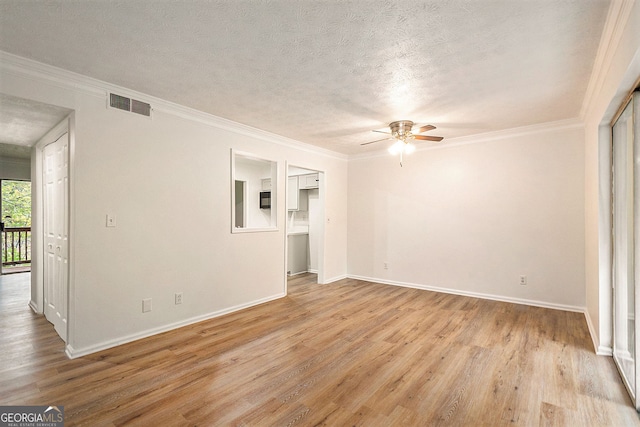 unfurnished living room featuring crown molding, light hardwood / wood-style floors, ceiling fan, and a textured ceiling