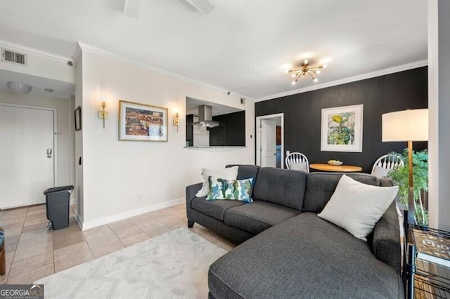 tiled living area featuring visible vents, baseboards, an accent wall, and crown molding