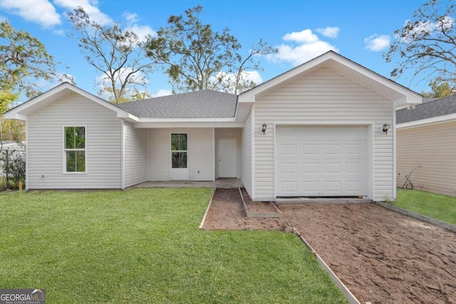 2005 Washington St, Savannah, GA 31406 - ranch-style home with an attached garage, driveway, a front lawn, and a shingled roof