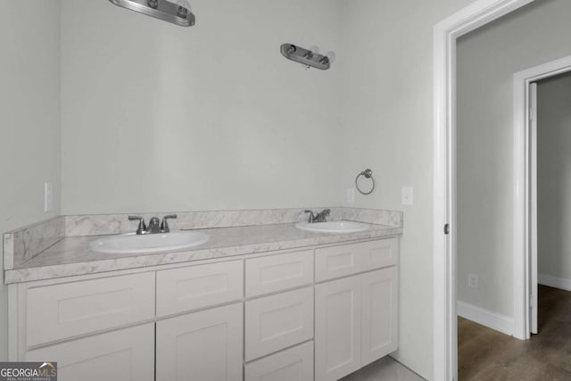 2005 Washington St, Savannah, GA 31406 - bathroom with wood finished floors and double vanity