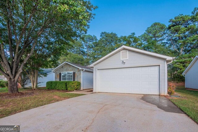 ranch-style house with a garage