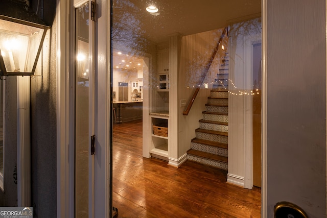 hall featuring dark wood-type flooring