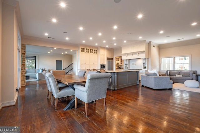 dining space featuring dark hardwood / wood-style floors