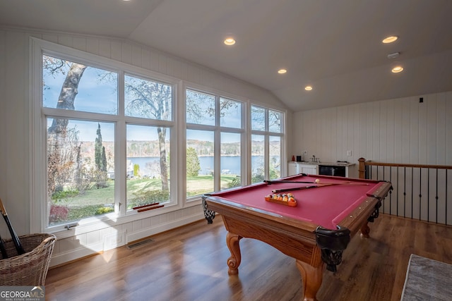 playroom featuring a water view, light hardwood / wood-style flooring, lofted ceiling, and billiards