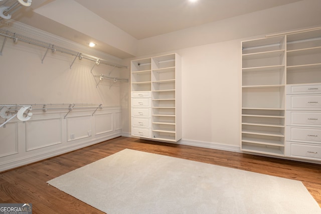 walk in closet featuring hardwood / wood-style flooring