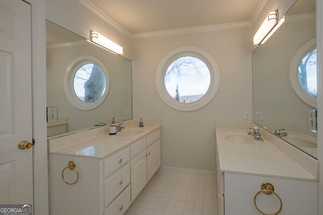 bathroom with vanity and ornamental molding