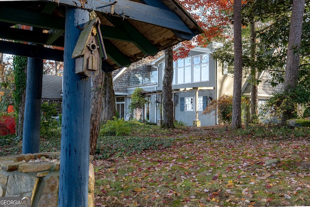 view of side of property with a gazebo