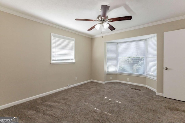 unfurnished room with carpet flooring, crown molding, and ceiling fan