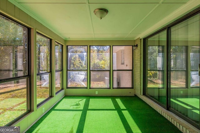 unfurnished sunroom with a healthy amount of sunlight