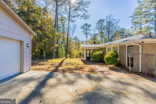 view of yard with a garage