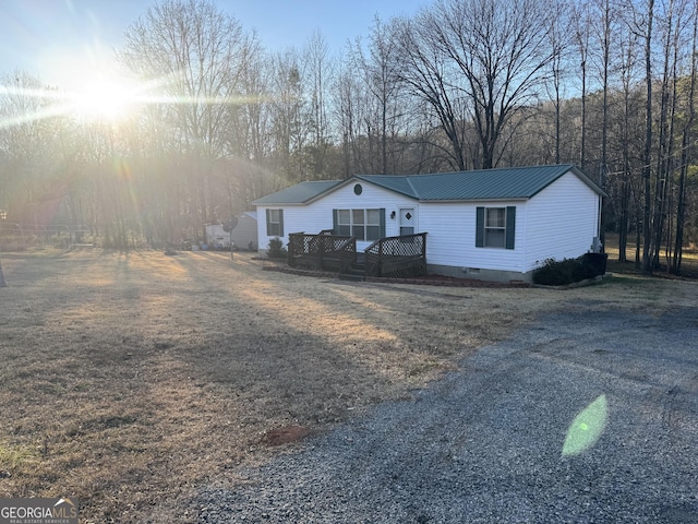 view of front of house with a deck