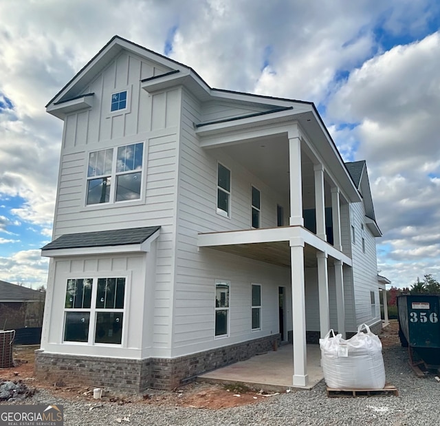 rear view of property with a patio