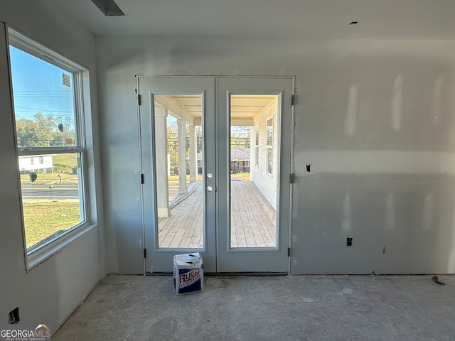 doorway to outside with plenty of natural light and french doors