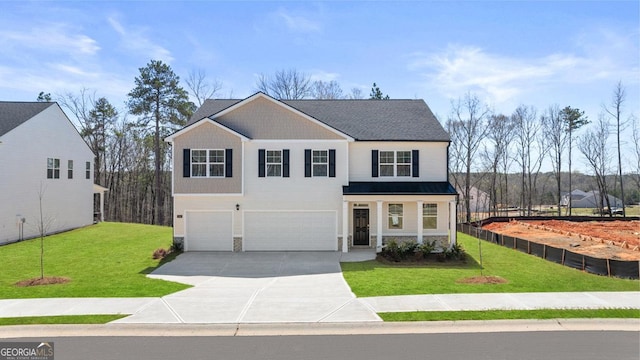 traditional-style home featuring a front yard, stone siding, a garage, and concrete driveway