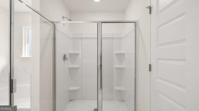 bathroom featuring a shower stall