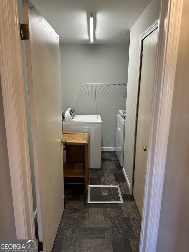 50 Pine Valley Dr, Athens, GA 30606 - laundry room with baseboards, independent washer and dryer, laundry area, and stone finish flooring